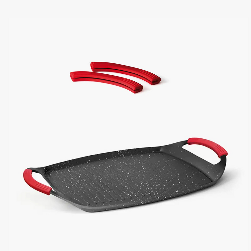 Asas ergonómicas de la Plancha Grill de Asar, pensadas para un agarre seguro y cómodo durante su uso.

